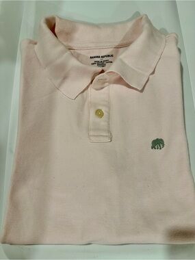 Banana Republic men’s polo in light pink, with gray elephant logo, size L